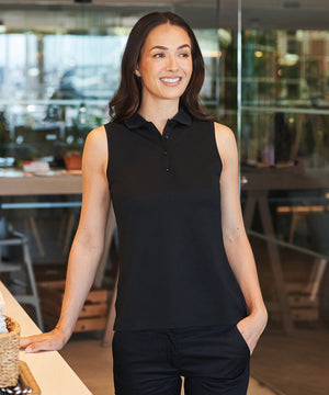 Lifestyle photo of the Women’s Sleeveless Coolplus® Polo Shirt