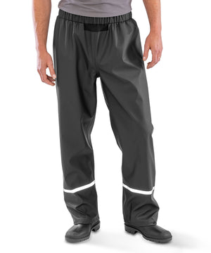 Lifestyle photo of the Prism PU Waterproof Trousers with Reflective Bands and Recycled Backing