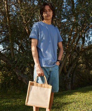 Lifestyle photo of the Cotton Pocket Jute Midi Tote in Natural