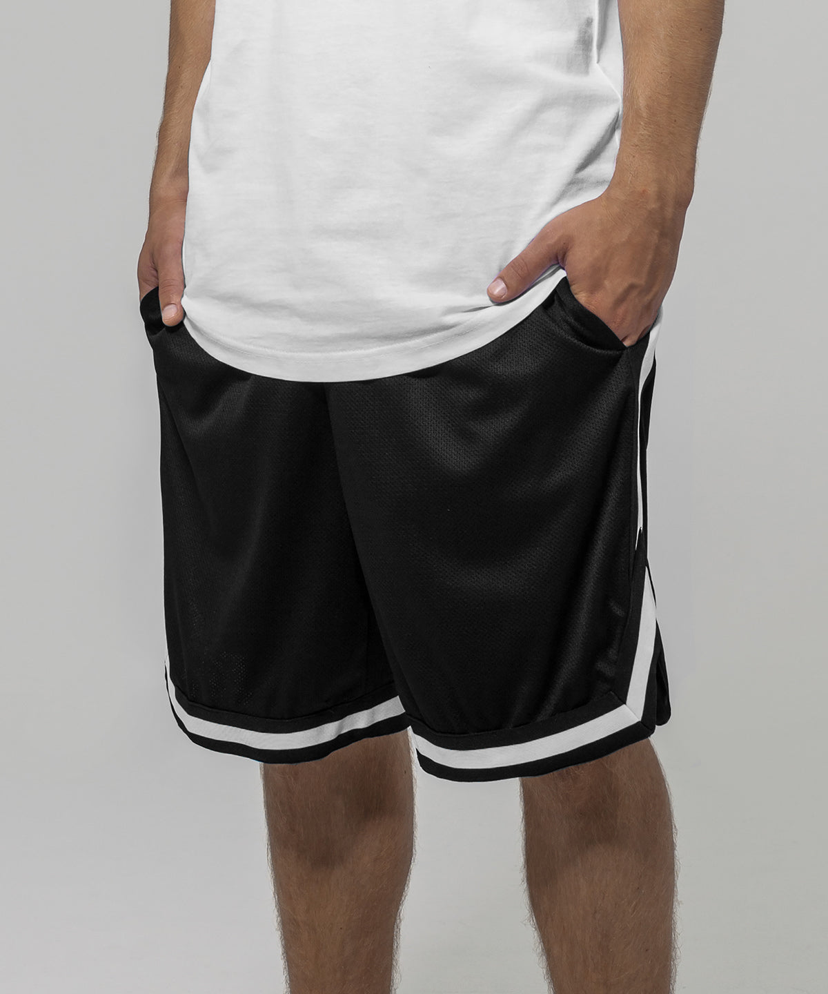 Lifestyle photo of the Two-Tone Mesh Shorts in Black/White