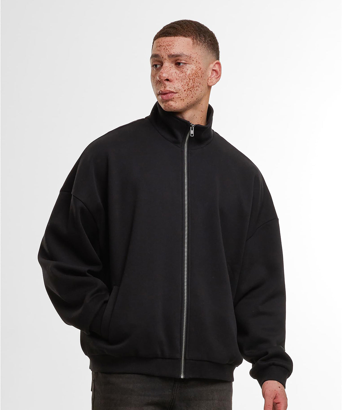 Lifestyle photo of the Oversized Zip Jacket in Black