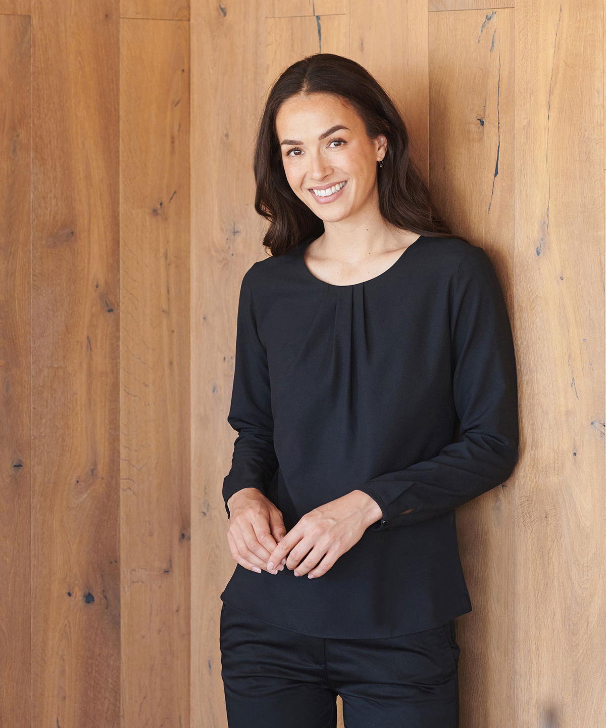 Lifestyle photo of the Women's Pleat Front Long Sleeve Blouse