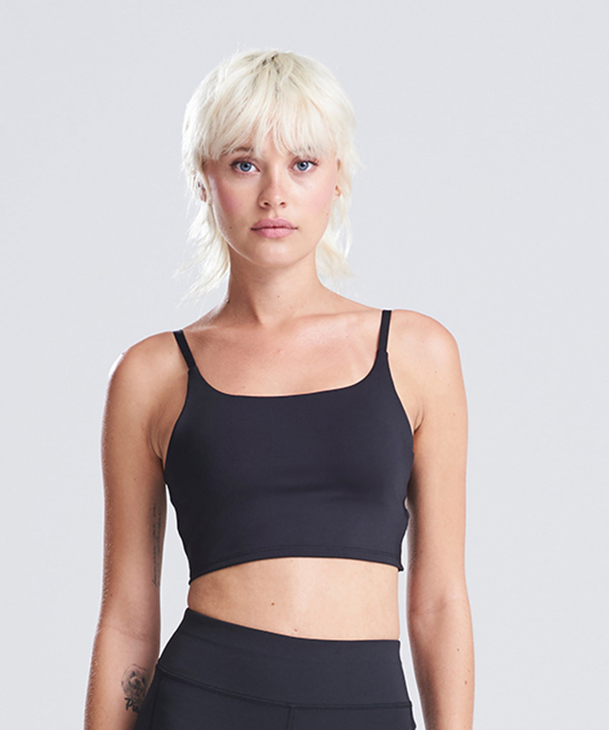 Lifestyle photo of the Women’s Recycled Tech Sports Bra