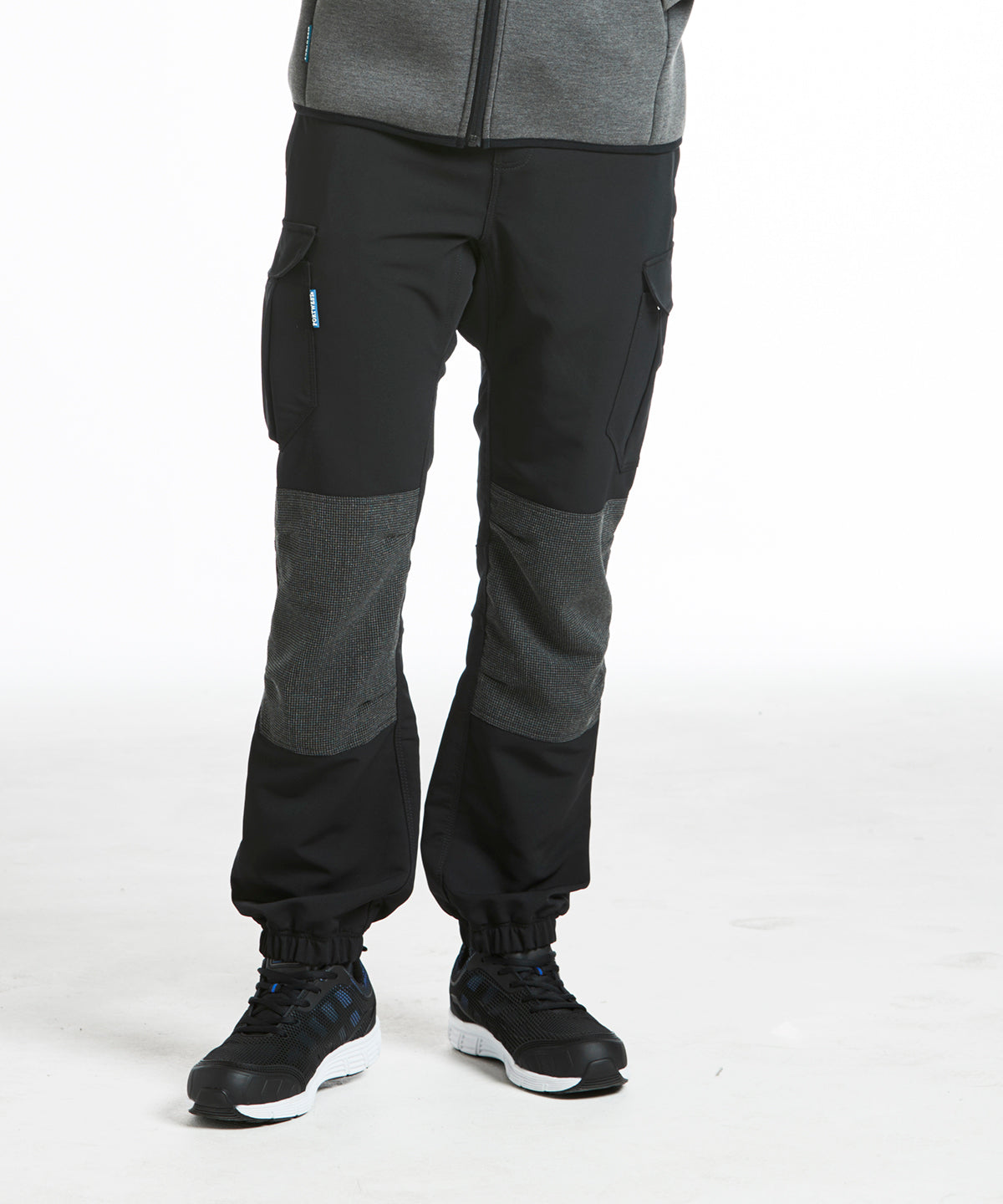 Lifestyle photo of the KX3 Flexi Trouser (T803) Slim Fit in Black