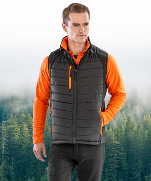 Lifestyle photo of the Compass Padded Softshell Gilet