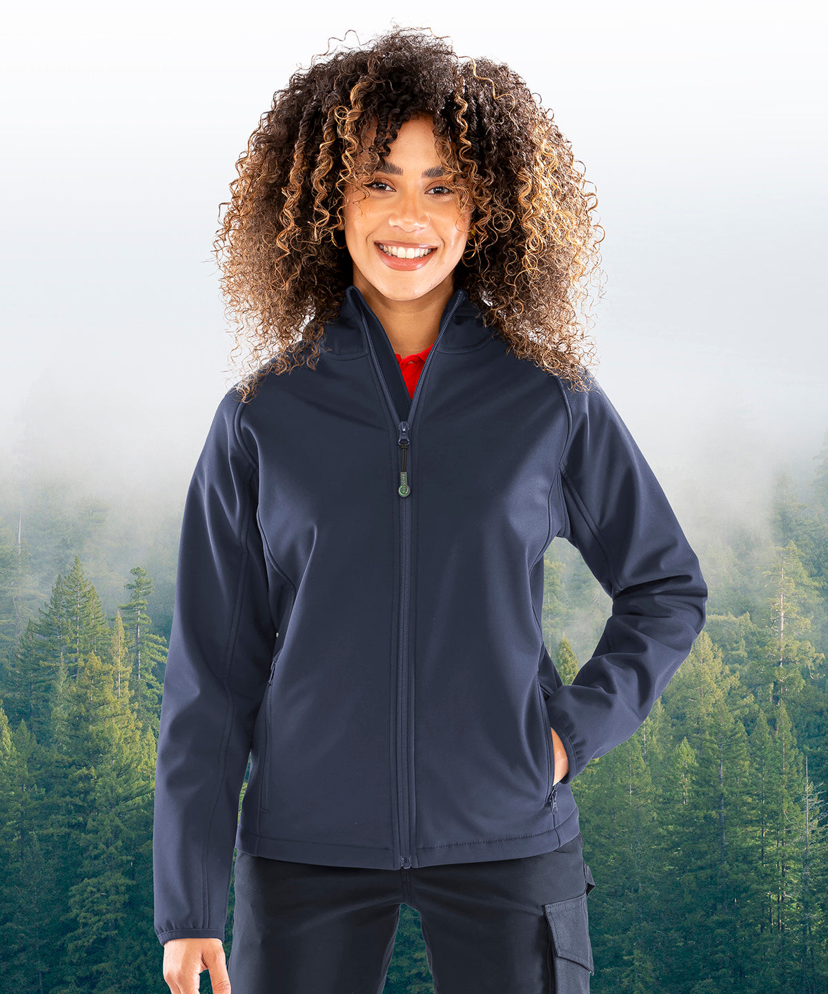 Lifestyle photo of the Women’s Recycled 3-Layer Printable Hooded Softshell