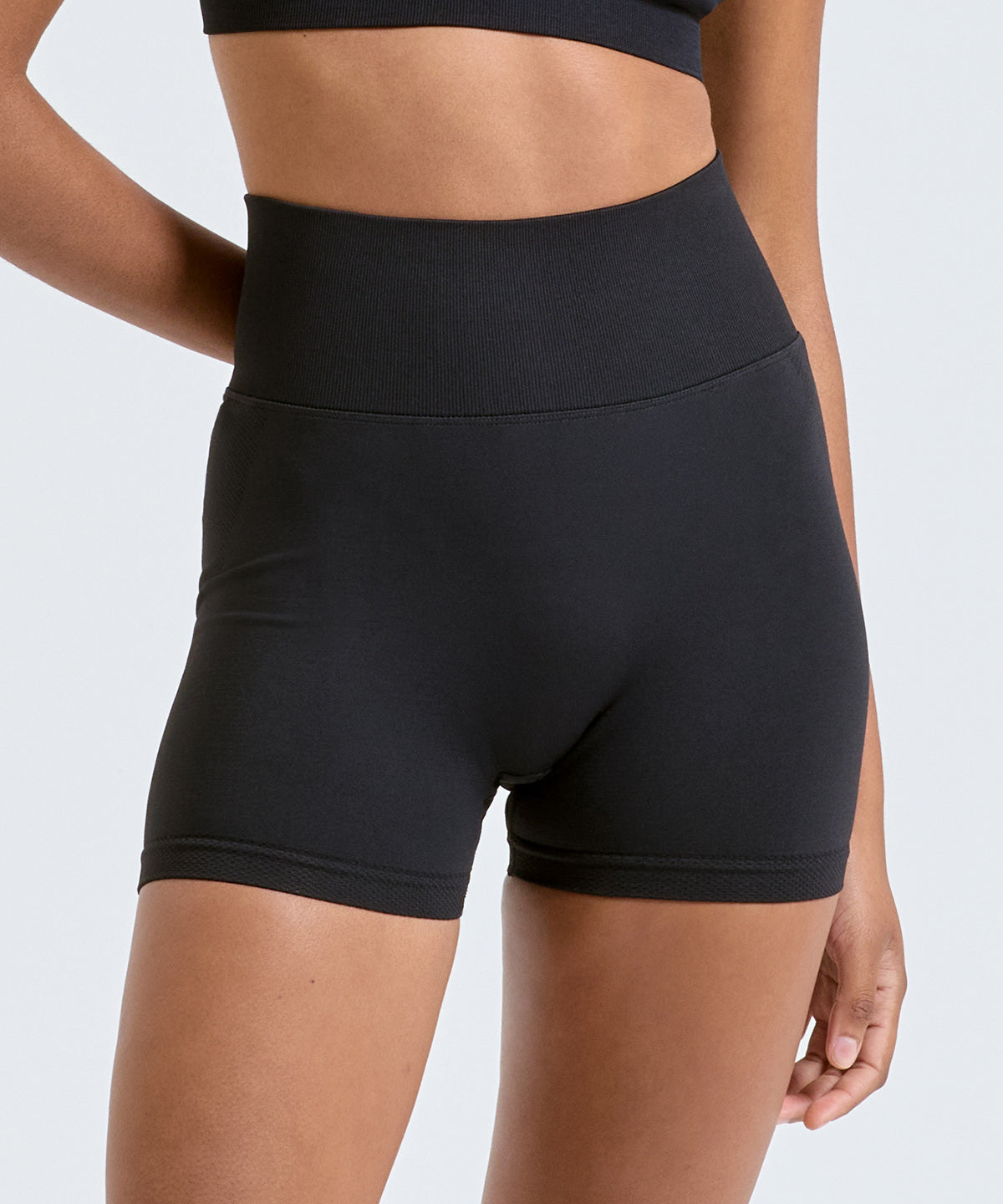 Lifestyle photo of the Women’s Tridri® Scrunch Shorts in Black