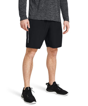 Lifestyle photo of the Tech Woven Wordmark Shorts